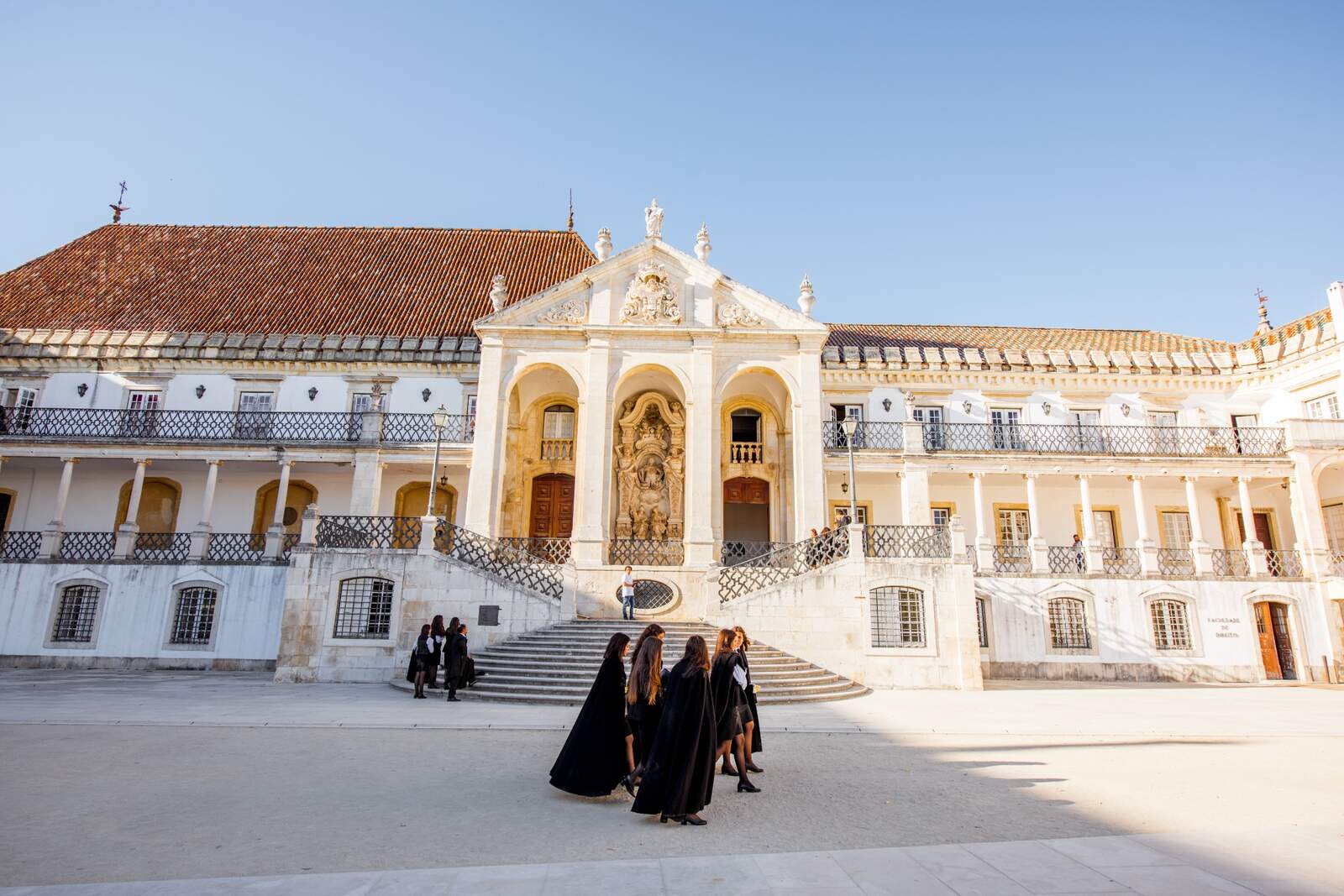 COIMBRA, PORTUGAL - September 26, 2017: View on the courtyard of the oldest university with students in black uniform in Coimbra city in the central Portugal